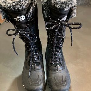 The North Face snow boots. Primaloft tech, warm, lace up. Low tread wear!